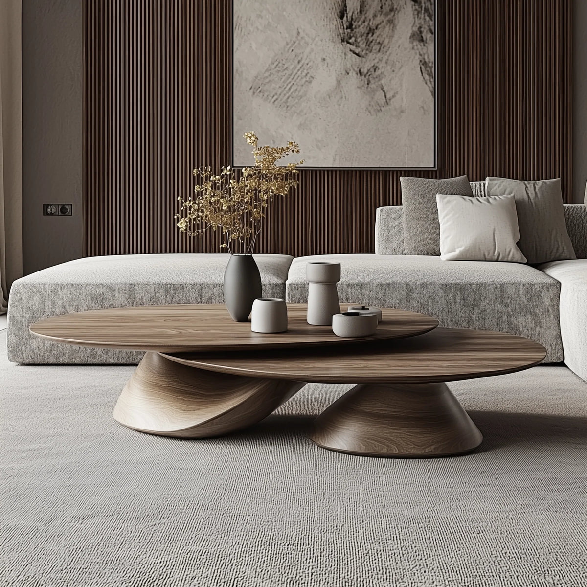 TWINCONE center table: two overlapping oval walnut tops at different heights on two hand-made cone-shaped wooden bases, in a grey living room